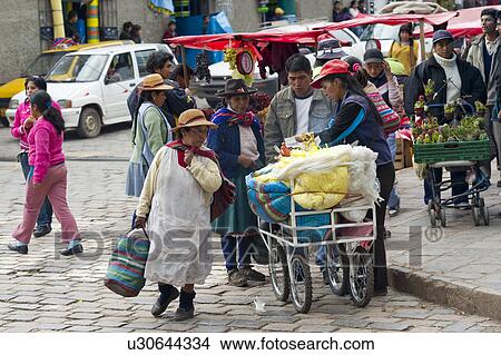 People shopping in a market, Sacred Valley, Cusco Region, Peru View Large Photo Image Picture - People shopping in a market, Sacred Valley, Cusco Region, Peru. Fotosearch