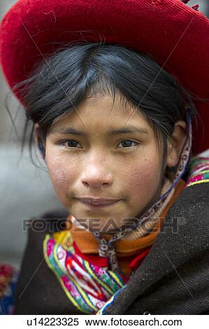 Portrait of a girl wearing a hat, Sacred Valley, Cusco Region, Peru View Large Photo Image Stock Photography - Portrait of a girl wearing a hat, Sacred Valley, Cusco Region, Peru. Fotosearch