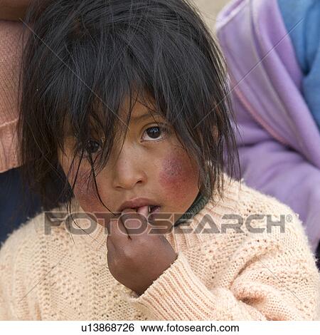 Portrait of a girl with tousled hair, Sacred Valley, Cusco Region, Peru View Large Photo Image Stock Photograph - Portrait of a girl with tousled hair, Sacred Valley, Cusco Region, Peru. Fotosearch