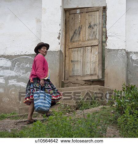 Quechua Indian woman walking towards the entrance of Chumpepoke Primary School, Poques, Sacred Valley, Cusco Region, Peru View Large Photo Image Stock Image - Quechua Indian woman walking towards the entrance of Chumpepoke Primary School, Poques, Sacred Valley, Cusco Region, Peru. Fotosearch