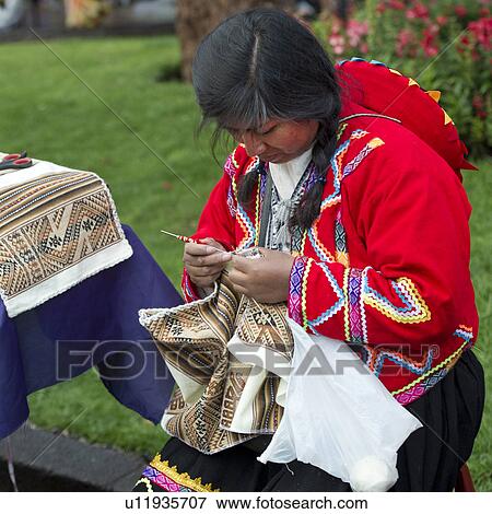 Quechua woman doing embroidery on a fabric, Plaza Regocijo, Cuzco, Peru View Large Photo Image Stock Photo - Quechua woman doing embroidery on a fabric, Plaza Regocijo, Cuzco, Peru. Fotosearch