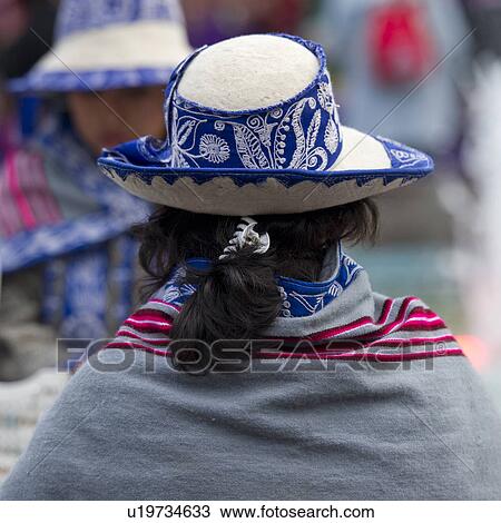 Stock Image - Rear view of a woman wearing a hat, Cuzco, Peru. Fotosearch