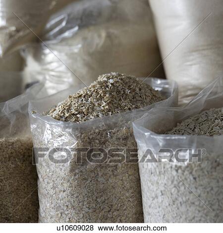 Rice corn flakes in sacks at a market stall, Mercado Central, Cuzco, Peru View Large Photo Image Stock Photo - Rice corn flakes in sacks at a market stall, Mercado Central, Cuzco, Peru. Fotosearch