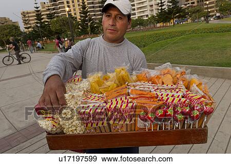 Stock Photo - Street vendor selling snacks at El Parque del Amor, Av De La Aviacion, Miraflores District, Lima Province, Peru. Fotosearch