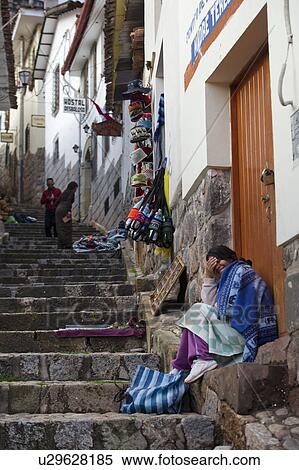 Stock Photography - Street vendors along a stepped walkway, Cuzco, Peru. Fotosearch