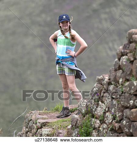 Stock Photo - Teenage girl at Archaeological Park of Pisac, Pisac, Sacred Valley, Cusco Region, Peru. Fotosearch