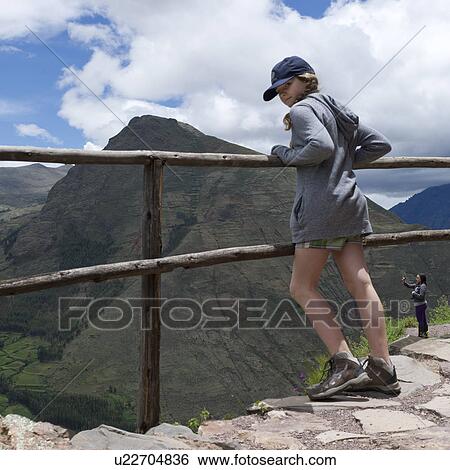 Stock Photograph - Teenage girl at Archaeological Park of Pisac, Pisac, Sacred Valley, Cusco Region, Peru. Fotosearch