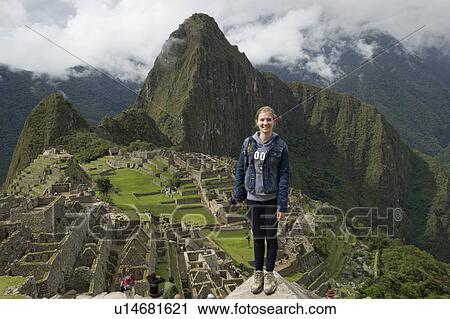 Teenage girl at The Lost City of The Incas, Machu Picchu, Cusco Region, Peru View Large Photo Image Stock Image - Teenage girl at The Lost City of The Incas, Machu Picchu, Cusco Region, Peru. Fotosearch
