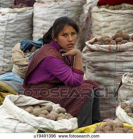 Teenage girl selling potatoes at Sunday market, Pisac, Cuzco, Peru View Large Photo Image Stock Photograph - Teenage girl selling potatoes at Sunday market, Pisac, Cuzco, Peru. Fotosearch