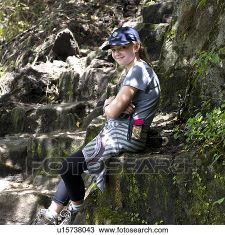 Teenage girl sitting on steps at The Lost City of The Incas, Machu Picchu, Cusco Region, Peru View Large Photo Image Stock Image - Teenage girl sitting on steps at The Lost City of The Incas, Machu Picchu, Cusco Region, Peru. Fotosearch