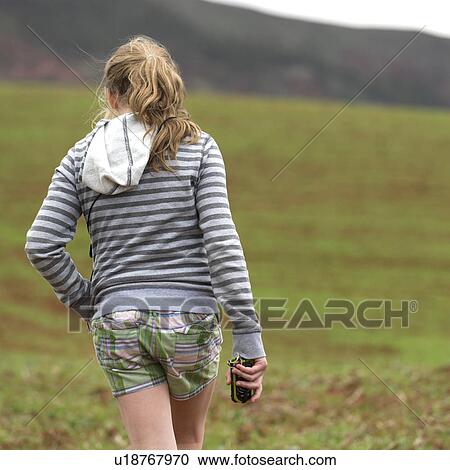 Teenage girl walking in a field, Sacred Valley, Cusco Region, Peru View Large Photo Image Stock Image - Teenage girl walking in a field, Sacred Valley, Cusco Region, Peru. Fotosearch