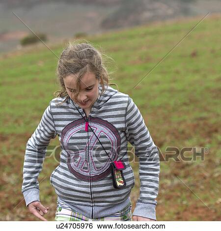 Teenage girl walking in a field, Sacred Valley, Cusco Region, Peru View Large Photo Image Stock Photograph - Teenage girl walking in a field, Sacred Valley, Cusco Region, Peru. Fotosearch