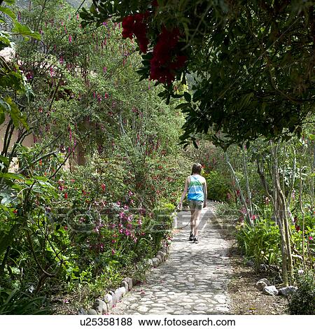 Teenage girl walking in the garden of Willka Tika Guesthouse, Willka Tika, Sacred Valley, Cusco Region, Peru View Large Photo Image Stock Photo - Teenage girl walking in the garden of Willka Tika Guesthouse, Willka Tika, Sacred Valley, Cusco Region, Peru. Fotosearch