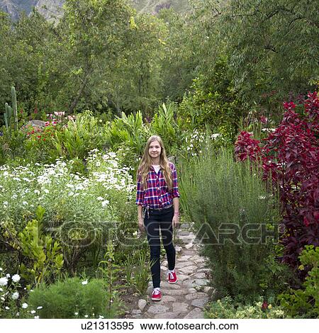 Teenage girl walking in the garden of Willka Tika Guesthouse, Willka Tika, Sacred Valley, Cusco Region, Peru View Large Photo Image Stock Photography - Teenage girl walking in the garden of Willka Tika Guesthouse, Willka Tika, Sacred Valley, Cusco Region, Peru. Fotosearch