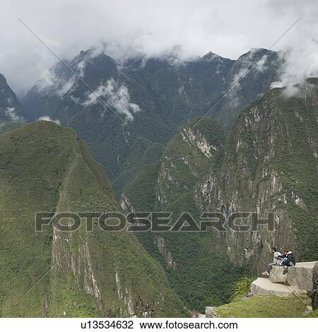 Tourists at The Lost City of The Incas, Machu Picchu, Cusco Region, Peru View Large Photo Image Stock Image - Tourists at The Lost City of The Incas, Machu Picchu, Cusco Region, Peru. Fotosearch