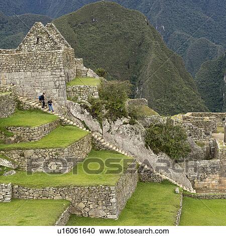 Tourists at The Lost City of The Incas, Machu Picchu, Cusco Region, Peru View Large Photo Image Stock Image - Tourists at The Lost City of The Incas, Machu Picchu, Cusco Region, Peru. Fotosearch