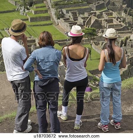 Tourists at The Lost City of The Incas, Machu Picchu, Cusco Region, Peru View Large Photo Image Stock Image - Tourists at The Lost City of The Incas, Machu Picchu, Cusco Region, Peru. Fotosearch