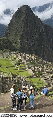 Tourists at The Lost City of The Incas, Machu Picchu, Cusco Region, Peru View Large Photo Image Stock Image - Tourists at The Lost City of The Incas, Machu Picchu, Cusco Region, Peru. Fotosearch