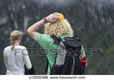 Tourists at The Lost City of The Incas, Machu Picchu, Cusco Region, Peru View Large Photo Image Stock Photo - Tourists at The Lost City of The Incas, Machu Picchu, Cusco Region, Peru. Fotosearch