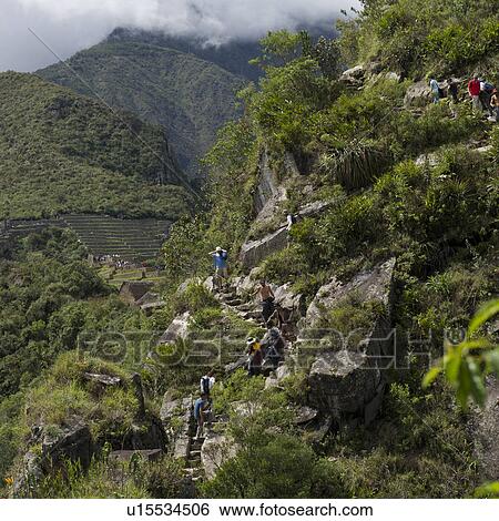 Tourists at The Lost City of The Incas, Mt Huayna Picchu, Machu Picchu, Cusco Region, Peru View Large Photo Image Stock Photograph - Tourists at The Lost City of The Incas, Mt Huayna Picchu, Machu Picchu, Cusco Region, Peru. Fotosearch