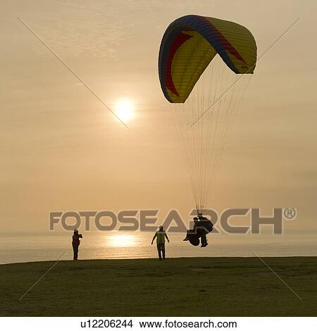 Tourists paragliding, Av De La Aviacion, Miraflores District, Lima Province, Peru View Large Photo Image Picture - Tourists paragliding, Av De La Aviacion, Miraflores District, Lima Province, Peru. Fotosearch