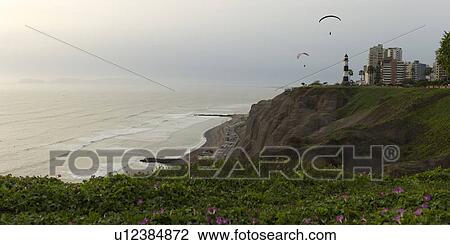 Stock Image - Tourists paragliding, Av De La Aviacion, Miraflores District, Lima Province, Peru. Fotosearch