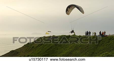Stock Photo - Tourists paragliding, Av De La Aviacion, Miraflores District, Lima Province, Peru. Fotosearch