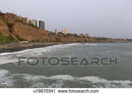 Waves with a city in the background, Miraflores District, Lima Province, Peru View Large Photo Image Stock Image - Waves with a city in the background, Miraflores District, Lima Province, Peru. Fotosearch