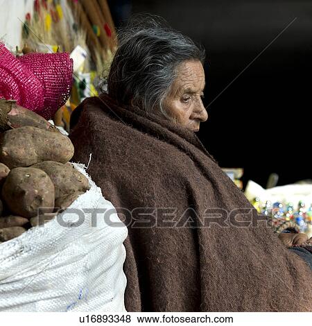 Woman at a market stall, Mercado Central, Cuzco, Peru View Large Photo Image Stock Photo - Woman at a market stall, Mercado Central, Cuzco, Peru. Fotosearch