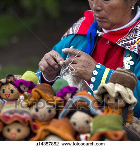 Woman selling dolls at a market, Plaza Regocijo, Cuzco, Peru View Large Photo Image Stock Image - Woman selling dolls at a market, Plaza Regocijo, Cuzco, Peru. Fotosearch