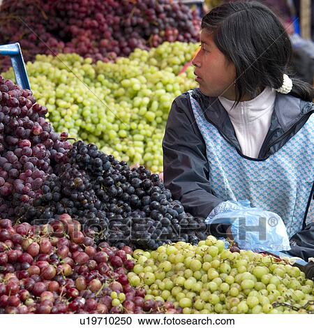 Woman selling fruits at Mercado Central, Cuzco, Peru View Large Photo Image Stock Image - Woman selling fruits at Mercado Central, Cuzco, Peru. Fotosearch
