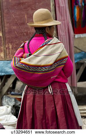 Woman shopping in a market, Pisac, Sacred Valley, Cusco Region, Peru View Large Photo Image Stock Image - Woman shopping in a market, Pisac, Sacred Valley, Cusco Region, Peru. Fotosearch