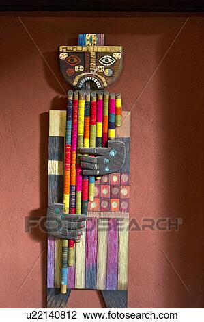 Stock Image - Wooden sculpture in a guesthouse, Willka Tika, Sacred Valley, Cusco Region, Peru. Fotosearch
