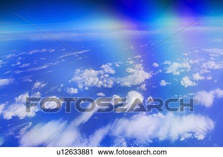 Stock Image - Aerial view of clouds over sea. Fotosearch