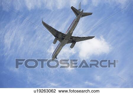 Airplane in flight View Large Photo Image Stock Image - Airplane in flight. Fotosearch