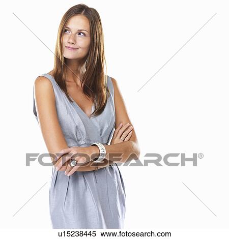 Beautiful woman smiling and looking away with hands folded View Large Photo Image Stock Photography - Beautiful woman smiling and looking away with hands folded. Fotosearch
