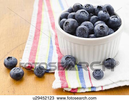 Stock Image - Bowl of blueberries. Fotosearch