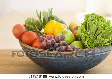 Bowl of organic fruit and vegetables View Large Photo Image Stock Photo - Bowl of organic fruit and vegetables. Fotosearch