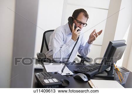 Businessman at work View Large Photo Image Stock Image - Businessman at work. Fotosearch