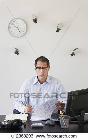 Businessman under surveillance of security cameras View Large Photo Image Stock Image - Businessman under surveillance of security cameras. Fotosearch