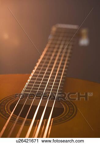 Close up of acoustic guitar View Large Photo Image Stock Image - Close up of acoustic guitar. Fotosearch