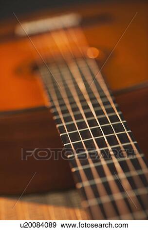 Close up of acoustic guitar View Large Photo Image Stock Photo - Close up of acoustic guitar. Fotosearch