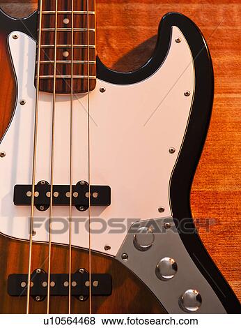 Close up of bass guitar View Large Photo Image Stock Photo - Close up of bass guitar. Fotosearch