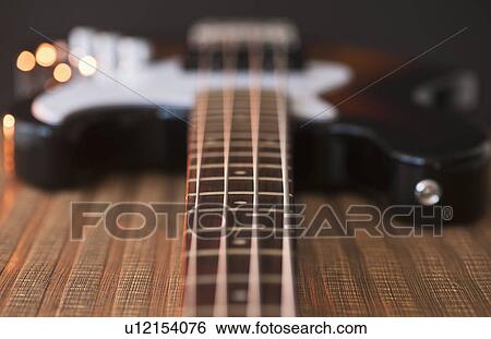 Close up of bass guitar View Large Photo Image Stock Photograph - Close up of bass guitar. Fotosearch