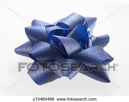 Close-up of blue and silver ribbon, studio shot View Large Photo Image Stock Photo - Close-up of blue and silver ribbon, studio shot. Fotosearch