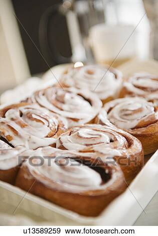Stock Photo - Close up of cinnamon buns. Fotosearch