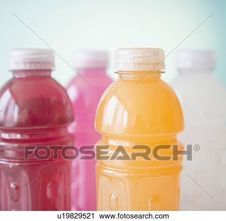 Stock Image - Close up of colorful plastic bottles. Fotosearch