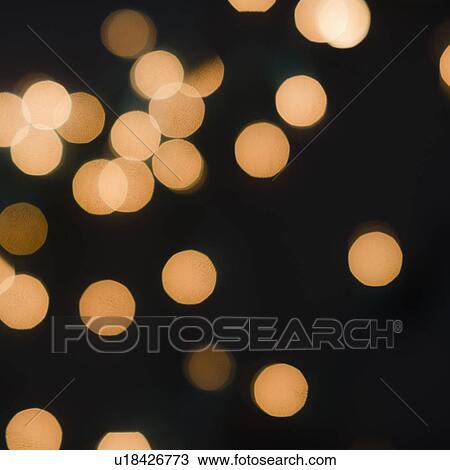 Stock Image - Close up of defocused lights. Fotosearch