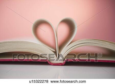 Stock Photo - Close up of hear shape made of pages of open book. Fotosearch