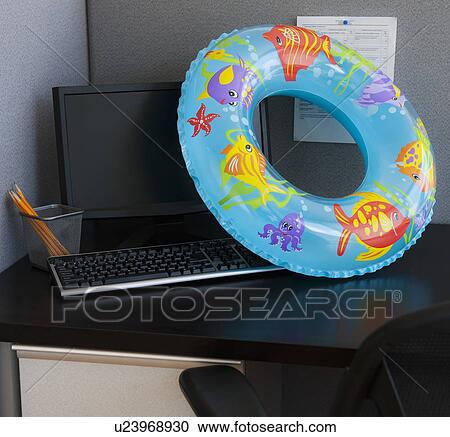 Close up of inflatable ring on office desk View Large Photo Image Stock Image - Close up of inflatable ring on office desk. Fotosearch